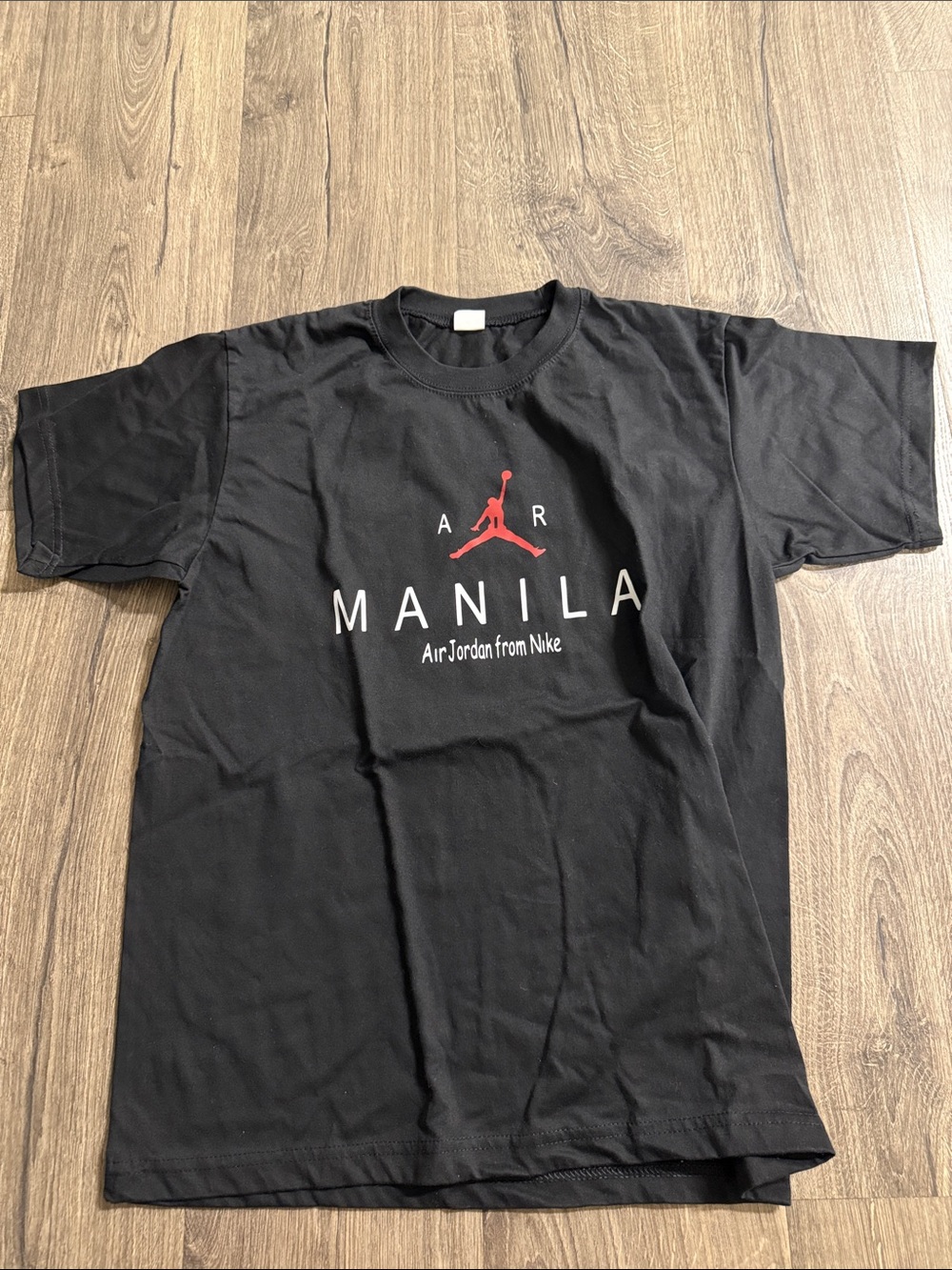 Boys youth Jordan Black Tee with Red Jumpman and Manila Text